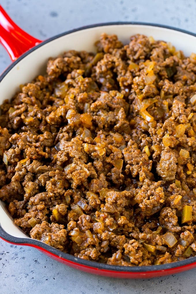 Dorito Casserole Recipe | Mexican Casserole | Beef Casserole #mexicanfood #beef #groundbeef #casserole #dinner #bajap Ground beef, onions and salsa in a skillet.