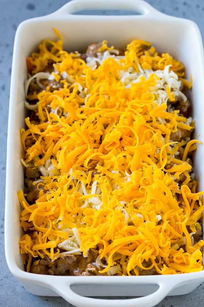 Dorito Casserole Recipe | Mexican Casserole | Beef Casserole #mexicanfood #beef #groundbeef #casserole #dinner #bajap A dish layered with chips, ground beef and shredded cheese.