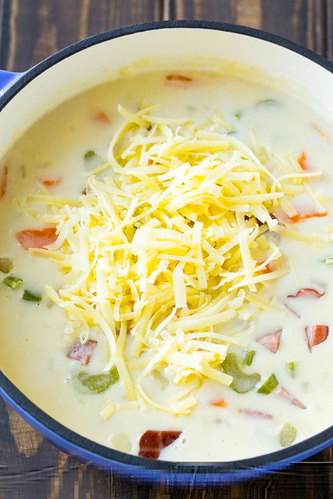Ham and Potato Soup | Ham Soup | Potato Soup #soup #ham #potato #dinner #comfortfood #bajap Shredded white cheddar cheese to be stirred into ham and potato soup.