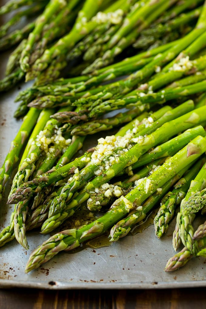 Roasted Asparagus Recipe | Baked Asparagus | Asparagus Side Dish #asparagus #garlic #sidedish #keto #lowcarb #dinner #bajap Raw spears drizzled with olive oil, garlic, herbs, salt and pepper.