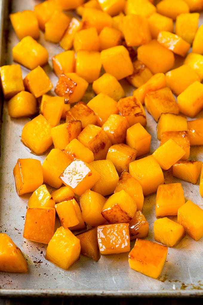 Roasted Butternut Squash Recipe | Baked Butternut Squash | Butternut Squash Side Dish #butternutsquash #squash #fall #vegetarian #dinner #bajap Caramelized cooked butternut squash on a sheet pan.