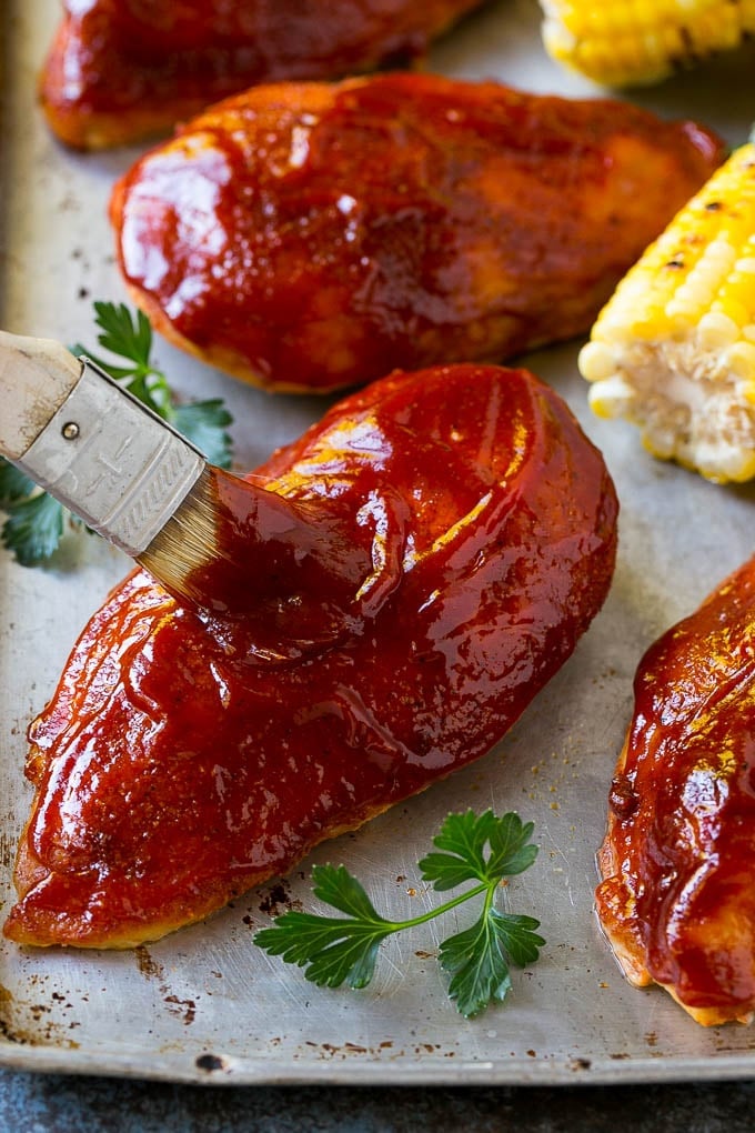 Smoked Chicken Breast Recipe | BBQ Chicken | Smoked Chicken #bbq #chicken #smoker #dinner #glutenfree #bajap Smoked chicken breasts being brushed with BBQ sauce.