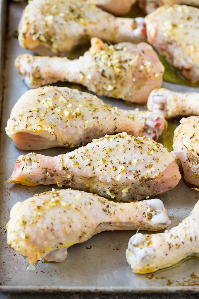 Baked Chicken Drumsticks Recipe | Roasted Chicken Drumsticks | Garlic and Herb Chicken #dinner #chicken #garlic #glutenfree #lowcarb #keto #cleaneating #bajap Marinated chicken legs on a sheet pan, ready to go into the oven.