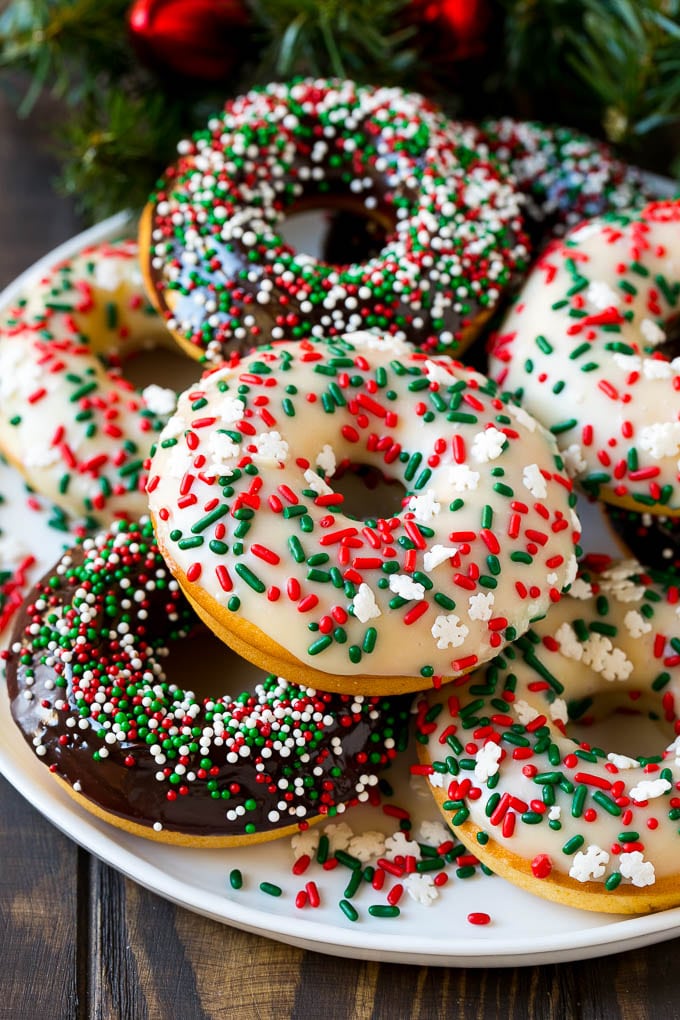 Baked Donuts Recipe | Cake Donuts | Chocolate Donuts | Sprinkle Donuts #donuts #chocolate #sprinkles #breakfast #brunch #bajap A serving plate of baked donuts frosted in dark and white chocolate and topped with sprinkles.