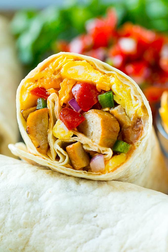 Breakfast Burrito Recipe | Sausage Breakfast Burrito #breakfast #sausage #eggs #burrito #bajap A breakfast burrito stuffed with sausage, eggs, pico de gallo and cheese.