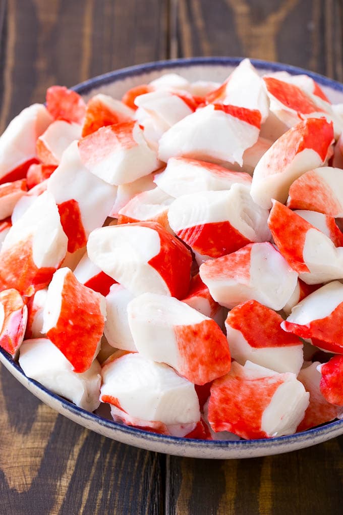 Crab Salad Recipe | Seafood Salad | Deli Salad #crab #salad #seafood #lowcarb #keto #lunch #dinner #bajap Imitation crab flakes in a bowl.