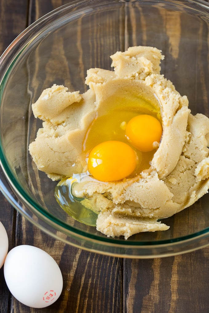 Eggnog Cookies Recipe | Holiday Cookies | Christmas Cookies #cookies #eggnog #baking #christmas #sprinkles #dessert #bajap Butter, sugar and eggs in a mixing bowl.