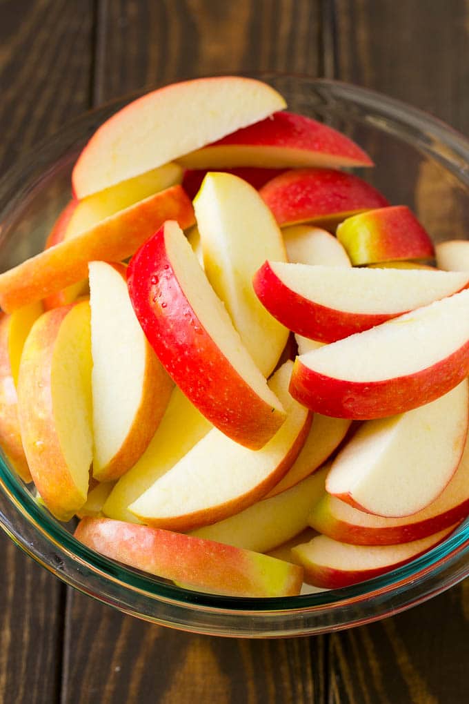 Fried Apples Recipe | Sauteed Apples | Cinnamon Sugar Apples #apples #cinnamon #sugar #sidedish #dessert #bajap #fall Sliced apples in a mixing bowl.