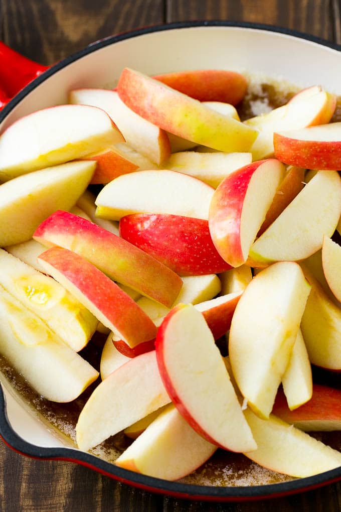 Fried Apples Recipe | Sauteed Apples | Cinnamon Sugar Apples #apples #cinnamon #sugar #sidedish #dessert #bajap #fall Sliced apples in a pan with butter, sugar and cinnamon.