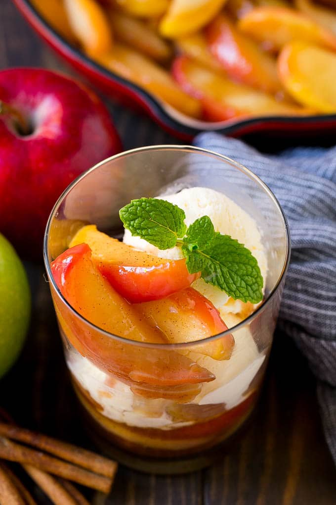 Fried Apples Recipe | Sauteed Apples | Cinnamon Sugar Apples #apples #cinnamon #sugar #sidedish #dessert #bajap #fall A cup of fried apples served with vanilla ice cream and garnished with fresh mint.