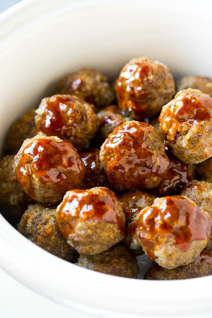 Sweet and Sour Meatballs Recipe | Slow Cooker Meatballs | Crockpot Meatballs | Cocktail Meatballs #meatballs #beef #slowcooker #crockpot #dinner #appetizer #bajap Meatballs in a slow cooker coated in sweet and sour sauce.