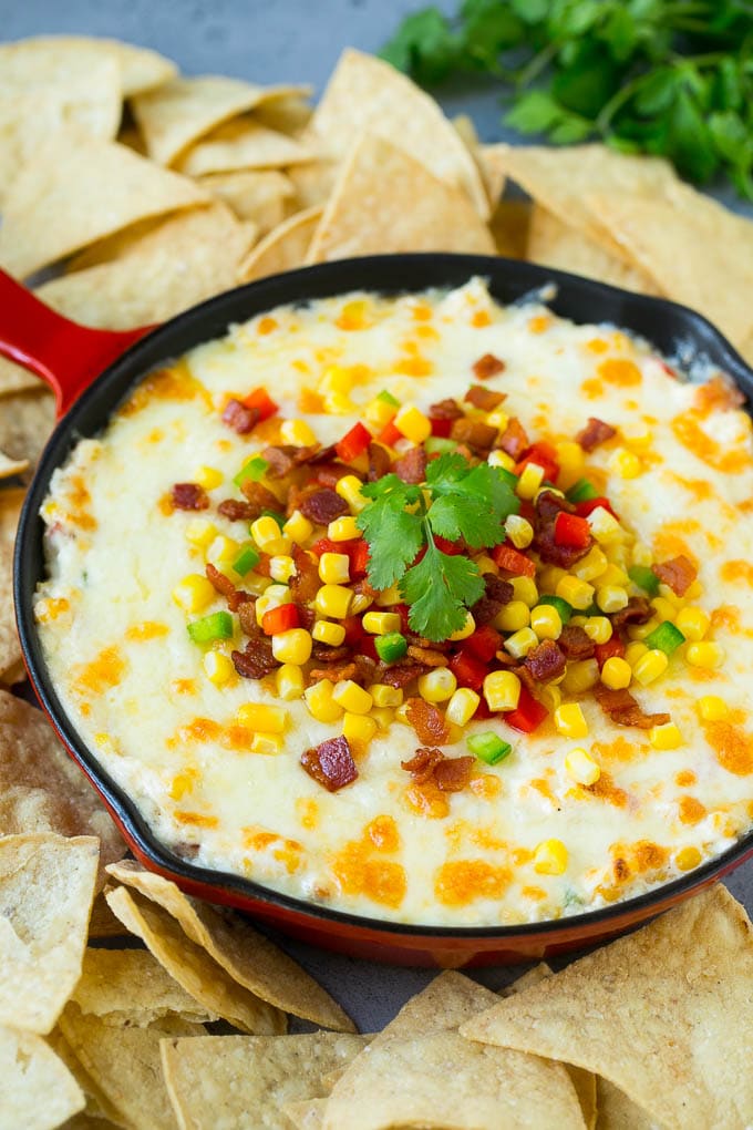 Corn Dip Recipe | Hot Cheese Dip | Bacon Dip #corn #dip #bacon #cheese #appetizer #snack #bajap Hot corn dip made with two types of cheese, corn, peppers and bacon, served with tortilla chips.