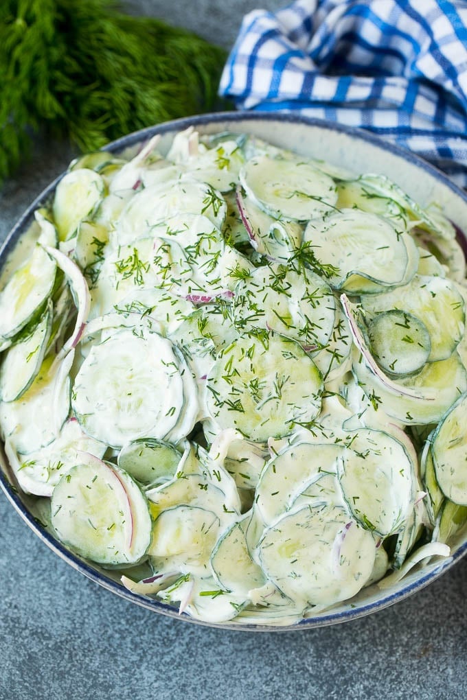 Creamy Cucumber Salad Recipe | German Cucumber Salad | Cucumber Salad #cucumber #salad #dinner #lunch #bajap #cucumbersalad Creamy cucumber salad with red onion and dill, topped with fresh herbs for garnish.