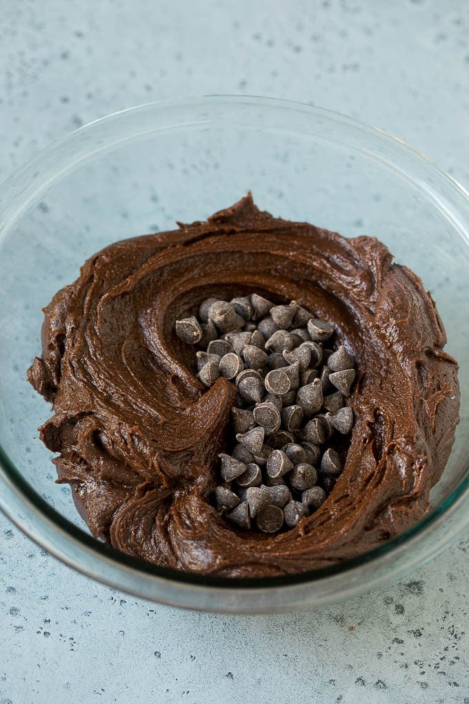 Cheesecake Brownies Recipe | Cream Cheese Brownies | Homemade Brownies #brownies #cheesecake #chocolate #dessert #bajap Brownie batter and chocolate chips in a mixing bowl.