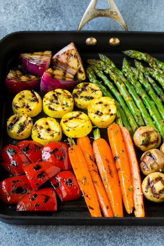 Grilled Vegetables Recipe | Marinated Vegetables | Grilled Veggies #vegetables #veggies #grilling #glutenfree #lowcarb #keto #dinner #bajap #cleaneating #healthy A grill pan with an assortment of vegetables cooking on it.