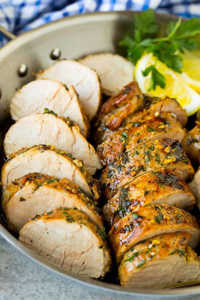 Marinated Pork Tenderloin Recipe | Pork Tenderloin Marinade | Pork Marinade #pork #porktenderloin #marinade #dinner #grilling #bajap Pork tenderloin marinade with sliced cooked pork in a skillet.