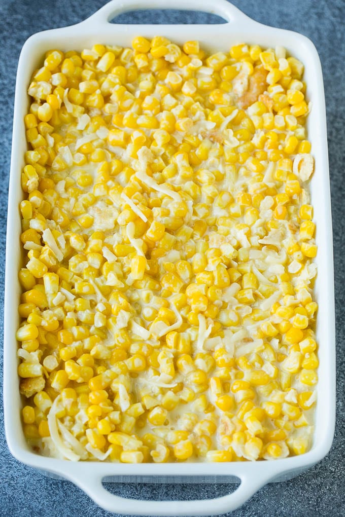 Scalloped Corn | Corn Casserole #corn #casserole #cheese #sidedish #dinner #bajap A baking pan of corn in a creamy custard mixture.
