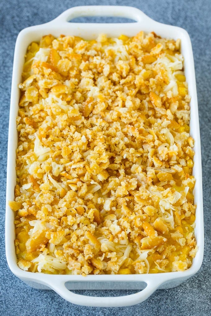 Scalloped Corn | Corn Casserole #corn #casserole #cheese #sidedish #dinner #bajap Scalloped corn topped with crushed crackers and shredded cheese.