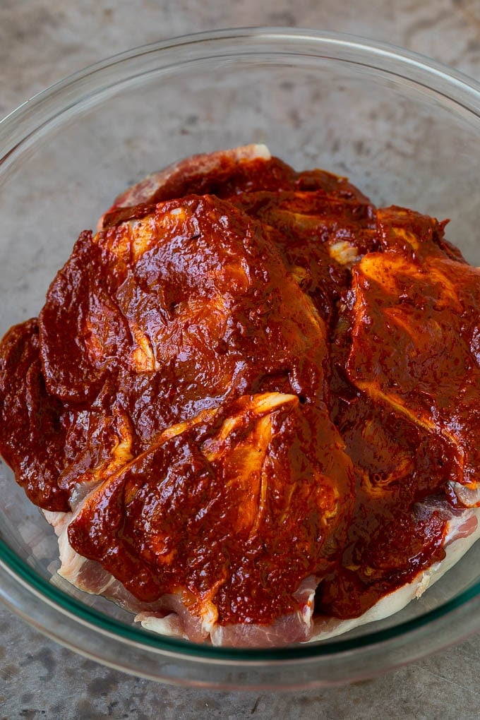 Tacos al Pastor Recipe | Pork Tacos | Mexican Tacos #tacos #pork #pineapple #grilling #tacotuesday #dinner #bajap Sliced pork shoulder coated in a chile based marinade.
