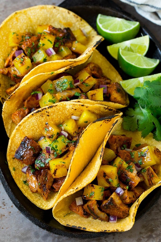 Tacos al Pastor Recipe | Pork Tacos | Mexican Tacos #tacos #pork #pineapple #grilling #tacotuesday #dinner #bajap Tacos al pastor filled with marinated pork and pineapple.