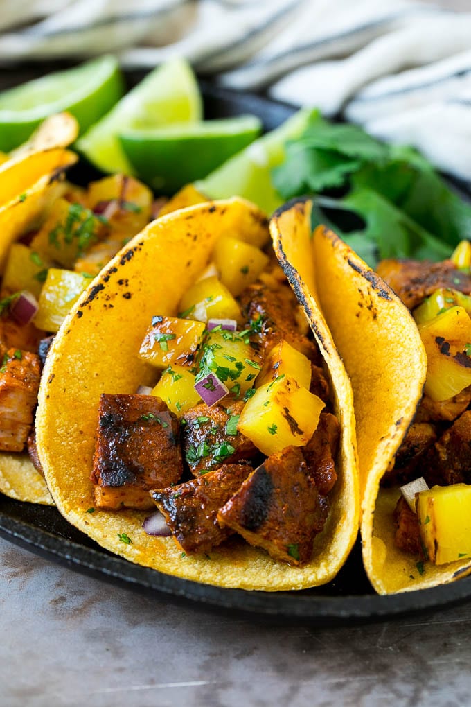Tacos al Pastor Recipe | Pork Tacos | Mexican Tacos #tacos #pork #pineapple #grilling #tacotuesday #dinner #bajap Tacos al pastor stuffed with grilled pork, pineapple, red onion and cilantro.