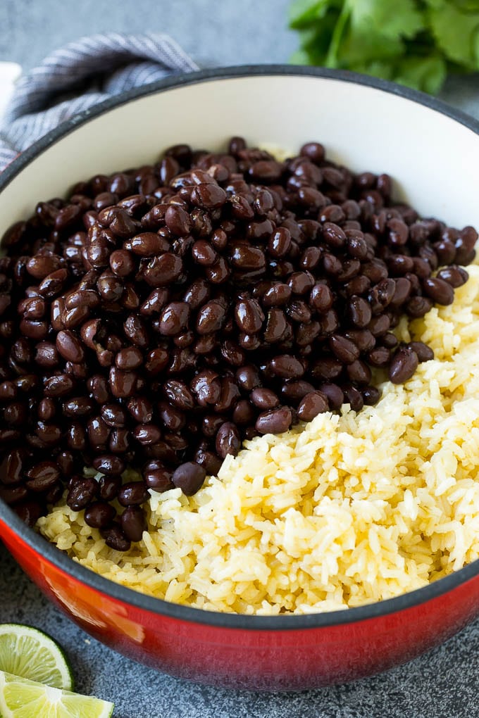 Black Beans and Rice Recipe | Cuban Black Beans | Beans and Rice #beans #rice #blackbeans #sidedish #glutenfree #dinner #bajap Cooked rice and black beans in a pot.