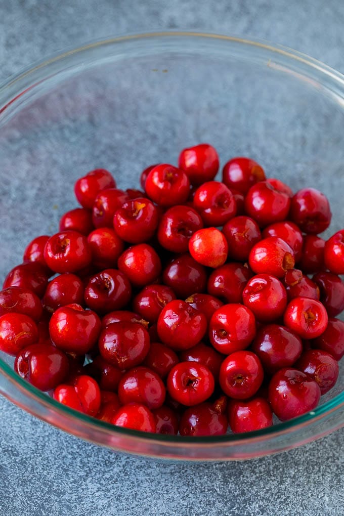 Cherry Pie Filling Recipe #pie #cherries #dessert #sweets #bajap #summer A bowl of pitted cherries.