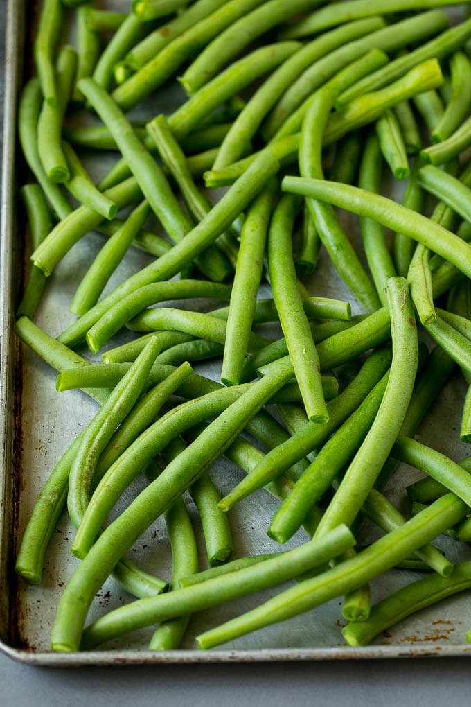 Fried Green Beans Recipe | Green Beans #greenbeans #appetizer #snack #bajap Green beans on a sheet pan.