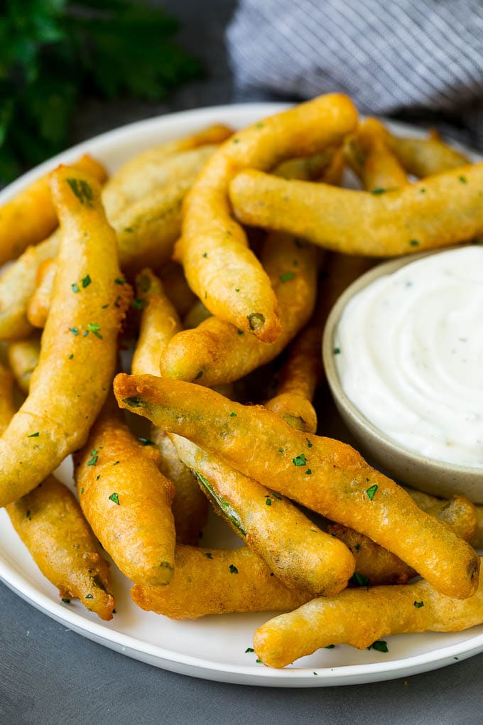 Fried Green Beans Recipe | Green Beans #greenbeans #appetizer #snack #bajap A plate of fried green beans served with ranch dip.