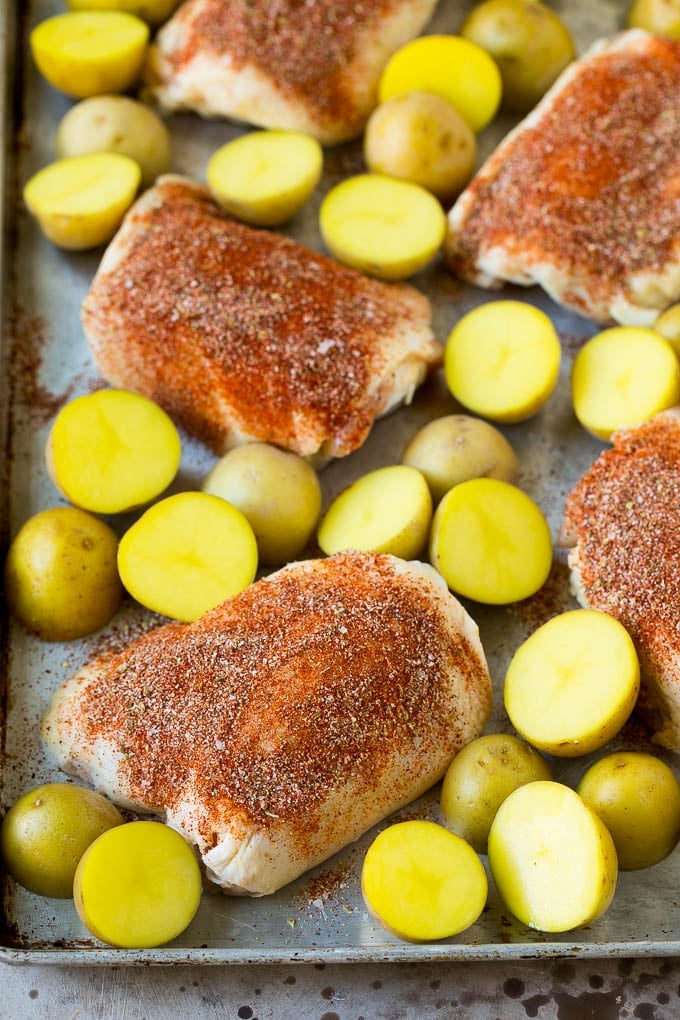 Spanish Chicken Recipe | Sheet Pan Meal | Chicken and Potatoes #spanishfood #chicken #sausage #potatoes #dinner #bajap Thighs coated in spices with small Yukon golds.
