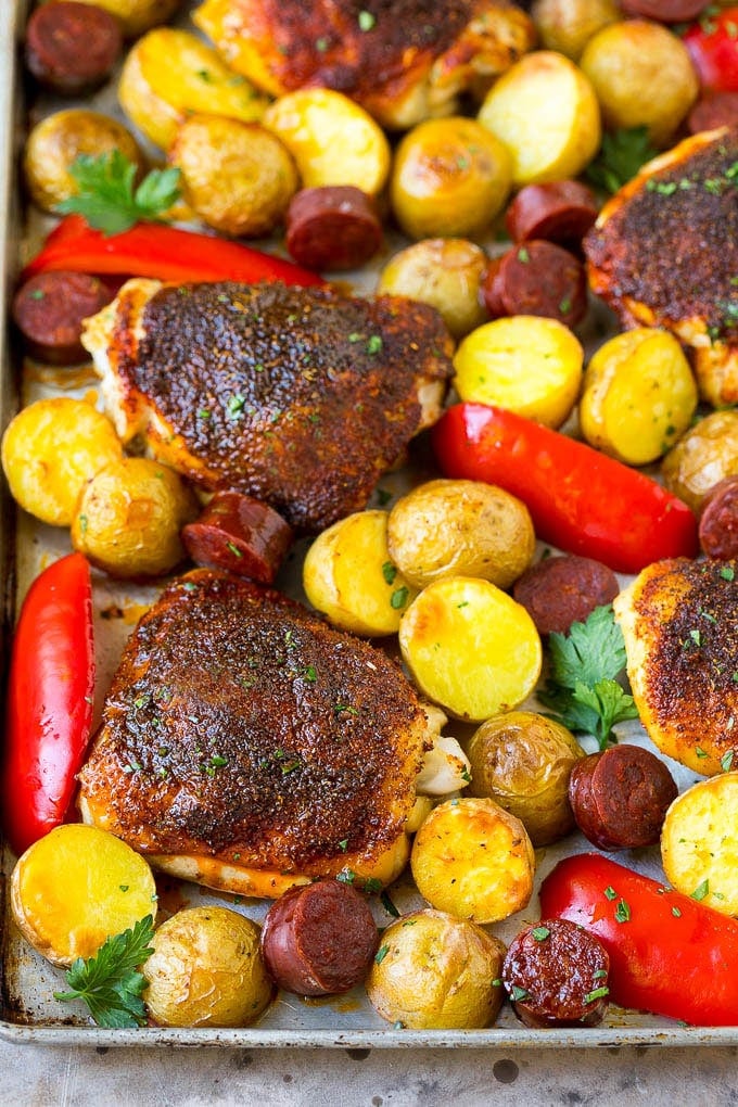 Spanish Chicken Recipe | Sheet Pan Meal | Chicken and Potatoes #spanishfood #chicken #sausage #potatoes #dinner #bajap A sheet pan of Spanish chicken with potatoes, bell peppers and sausage.