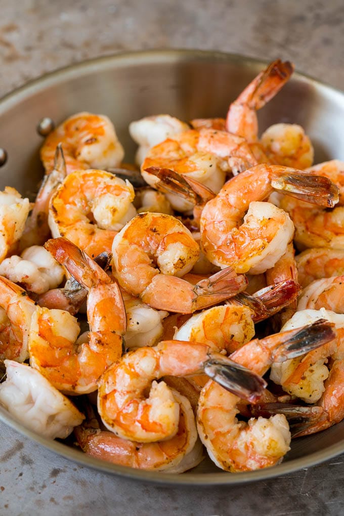 Surf and Turf Recipe | Seared Steak #steak #shrimp #keto #lowcarb #dinner #bajap Sauteed jumbo shrimp in a skillet.