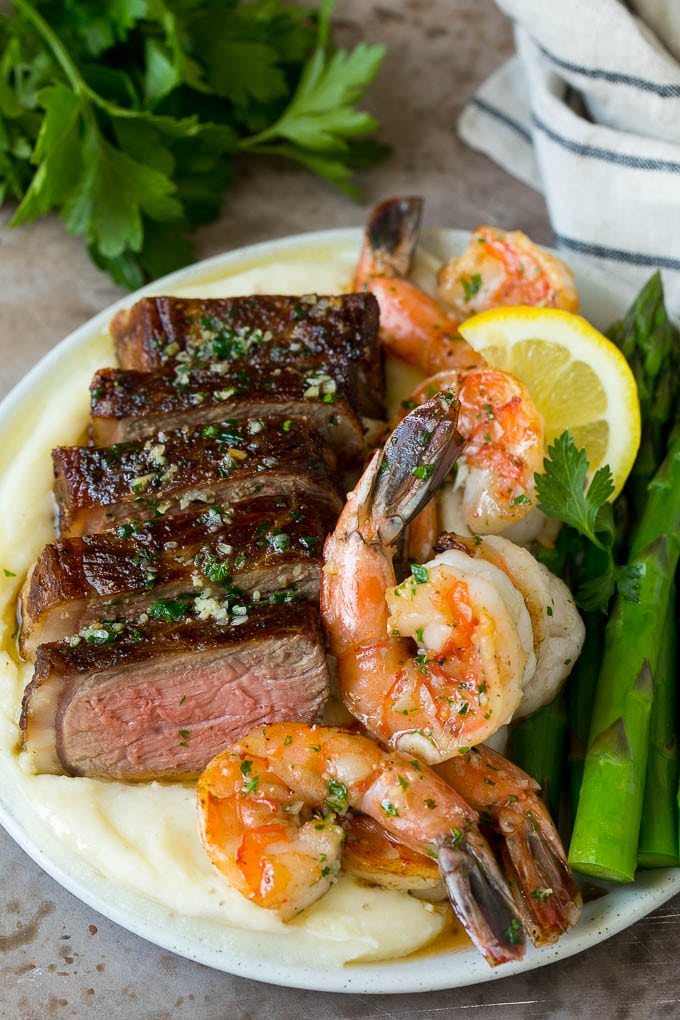 Surf and Turf Recipe | Seared Steak #steak #shrimp #keto #lowcarb #dinner #bajap Surf and turf with steak, shrimp, mashed potatoes and asparagus.