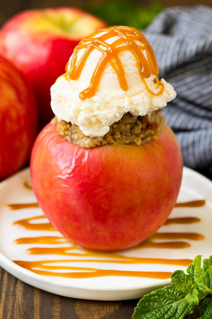 Baked Apples | Stuffed Apples #apples #fall #dessert #sweettooth #bajap A baked apple topped with vanilla ice cream and caramel sauce.