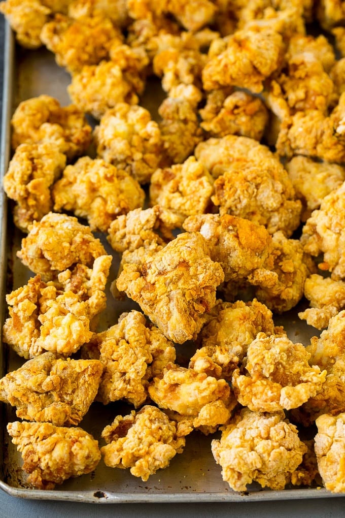 General Tso's Chicken Recipe #chicken #asianfood #dinner #bajap #copycatrecipe Breaded and fried chicken thigh pieces.