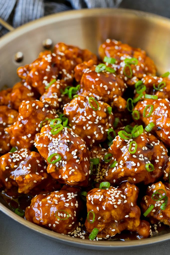 General Tso's Chicken Recipe #chicken #asianfood #dinner #bajap #copycatrecipe General Tso's chicken in a pan coated in a sweet and spicy sauce.