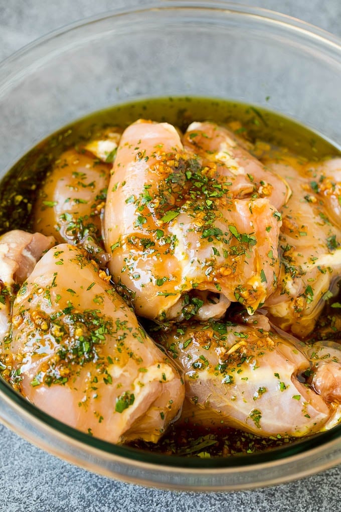 Grilled Chicken Thighs Recipe | Marinated Chicken Thighs #chicken #grilling #marinade #dinner #cilantro #lime #bajap Poultry in a bowl of marinade.