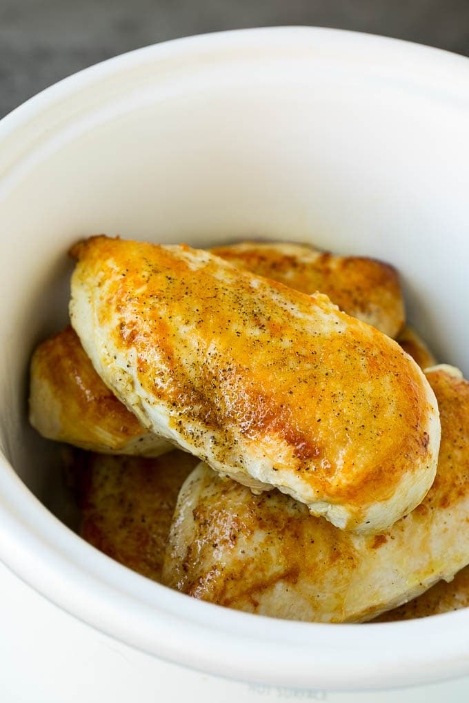 Slow Cooker Chicken Breast Recipe | Crock Pot Chicken Breast | Chicken and Gravy #chicken #slowcooker #crockpot #gravy #dinner #bajap Seared chicken breasts in a crock pot.