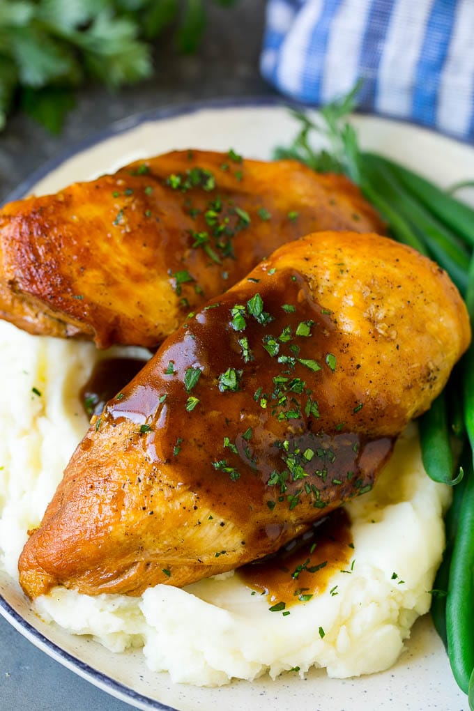 Slow Cooker Chicken Breast Recipe | Crock Pot Chicken Breast | Chicken and Gravy #chicken #slowcooker #crockpot #gravy #dinner #bajap Slow cooker chicken breast served with mashed potatoes and green beans.