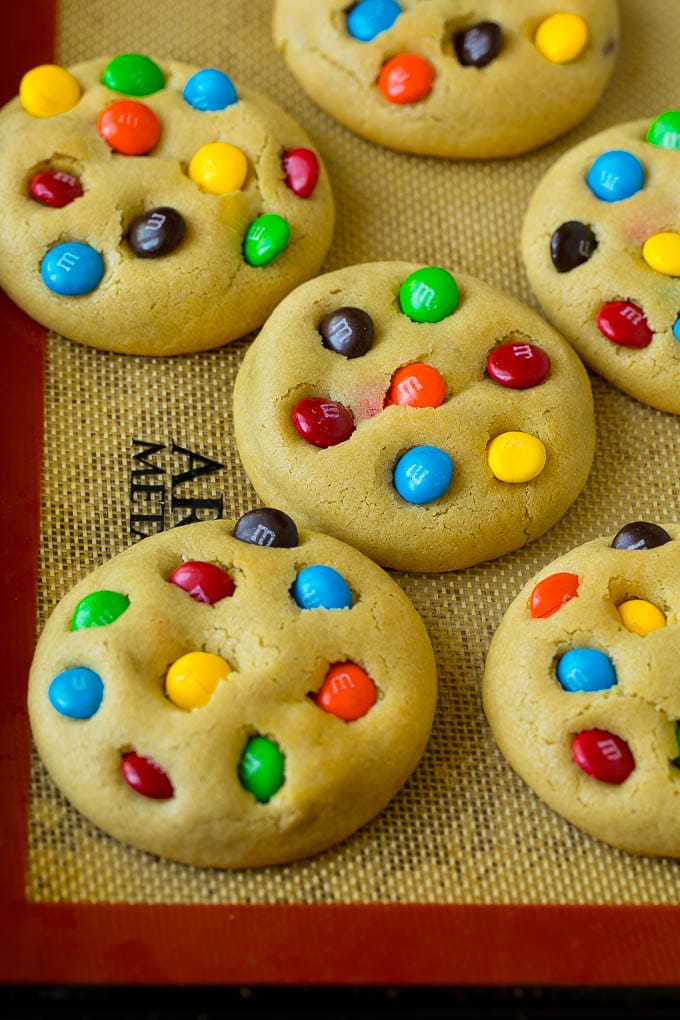 M&M Cookies Recipe #cookies #chocolate #baking #dessert #sweets #bajap Baked cookies on a sheet pan.