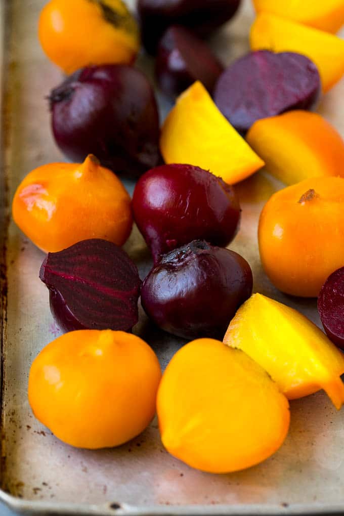 Beet Salad Recipe #beets #avocado #feta #salad #dinner #bajap Roasted red and yellow beets on a sheet pan.