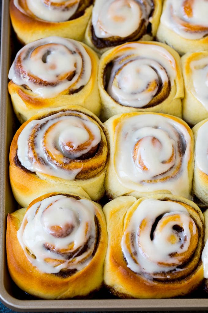 Cinnamon Rolls Recipe | Cinnamon Buns #cinnamon #rolls #pastry #breakfast #brunch #sweets #bajap #baking #bread A tray of frosted cinnamon rolls.