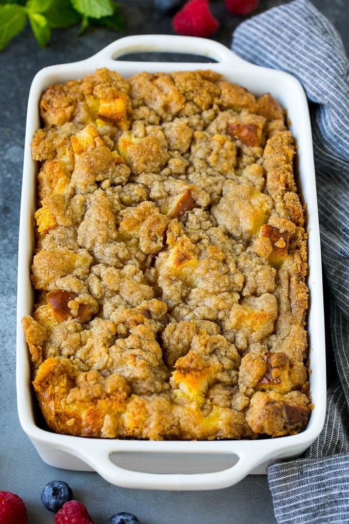 French Toast Casserole Recipe | French Toast Bake #frenchtoast #casserole #breakfast #brunch #bajap #bread A dish of french toast casserole topped with brown sugar streusel.