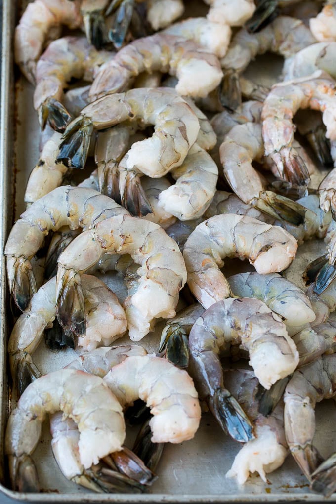 Fried Shrimp Recipe #shrimp #seafood #dinner #appetizer #bajap Raw shrimp on a sheet pan.