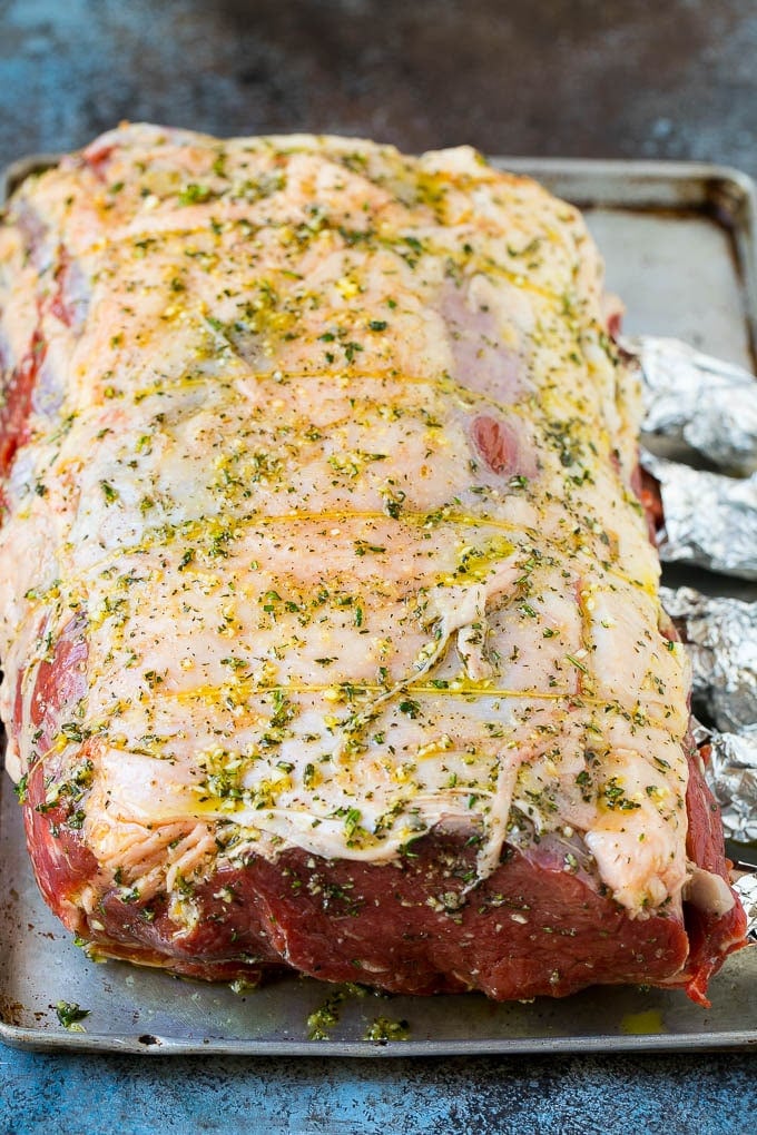Prime Rib Recipe #primerib #beef #roast #dinner #thanksgiving #christmas #keto #lowcarb #bajap Prime rib coated in garlic, herbs and olive oil.