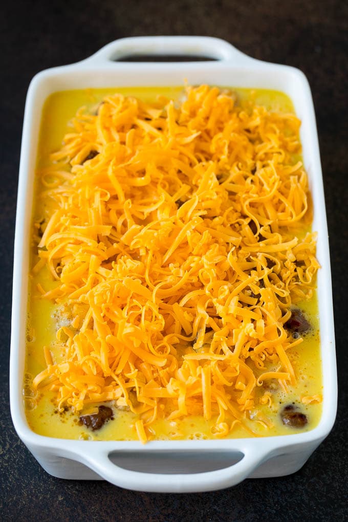 Sausage Egg Casserole Recipe | Egg Casserole #eggs #sausage #potato #cheese #casserole #breakfast #brunch #bajap An unbaked egg casserole ready to go into the oven.