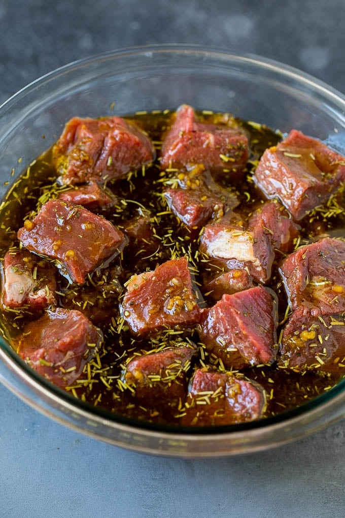 Beef Shish Kabobs Recipe | Beef Kabobs #grilling #beef #steak #dinner #bajap #peppers Steak cubes in a bowl of marinade.