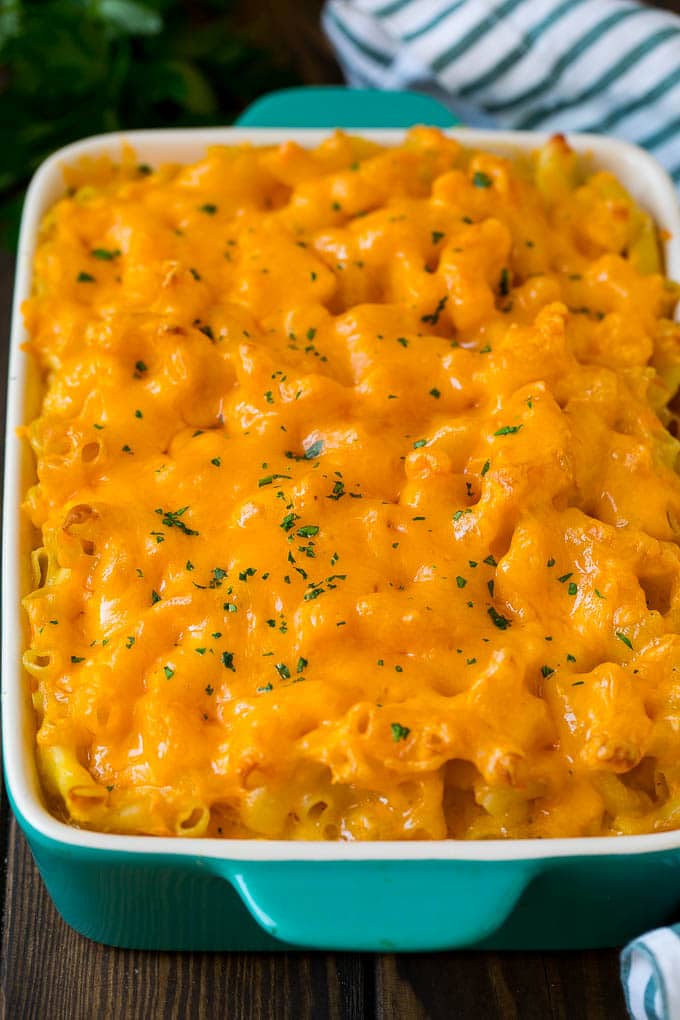 Southern Mac and Cheese | Baked Macaroni and Cheese #pasta #macandcheese #dinner #comfortfood #cheese #bajap Southern mac and cheese topped with melted cheddar and parsley.