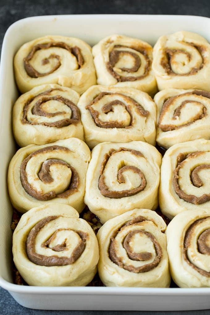 Sticky Buns Recipe | Sweet Rolls | Cinnamon Rolls #breakfast #brunch #cinnamon #pecans #bajap #bread Cinnamon swirl dough in a baking dish.