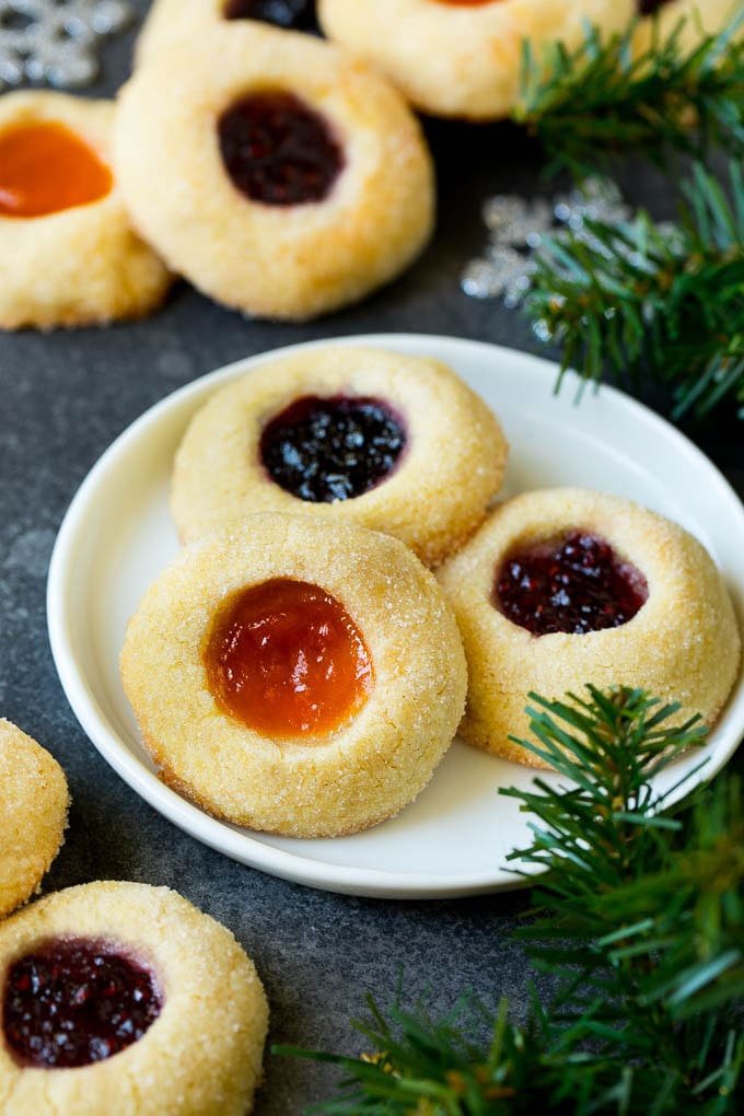 Thumbprint Cookies | Sugar Cookies #cookies #baking #christmas #dessert #bajap A plate of jam filled thumbprint cookies.